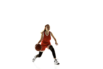 Image showing Young caucasian female basketball player against white studio background