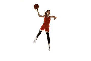 Image showing Young caucasian female basketball player against white studio background