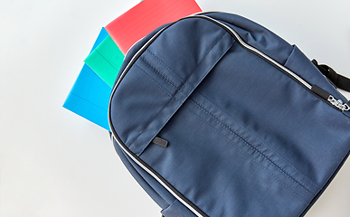 Image showing school backpack with notebooks on table