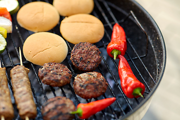 Image showing barbecue kebab meat and vegetables on grill