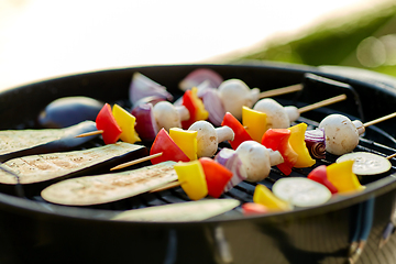 Image showing vegetables and mushrooms roasting on brazier grill