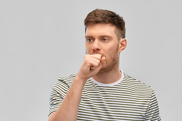 Image showing unhealthy young man coughing