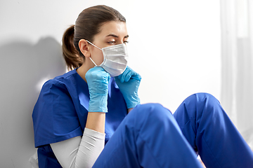 Image showing sad doctor or nurse in protective face mask