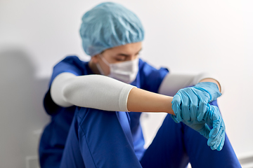 Image showing sad doctor or nurse in protective face mask