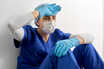 Image showing sad doctor or nurse in protective face mask