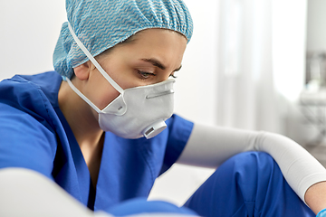 Image showing sad doctor or nurse in protective face mask