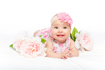 Image showing happy beautiful baby girl with flower on head