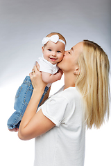 Image showing beautiful young mother with toddler baby girl