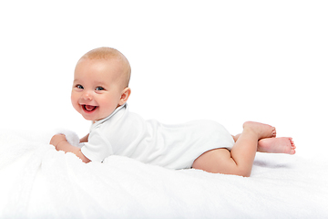 Image showing happy beautiful baby girl in white body suit