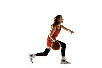 Image showing Young caucasian female basketball player against white studio background