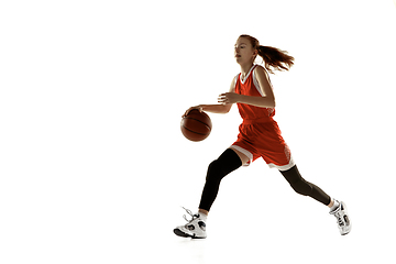 Image showing Young caucasian female basketball player against white studio background