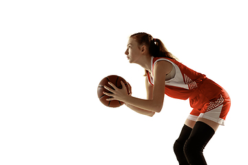 Image showing Young caucasian female basketball player against white studio background