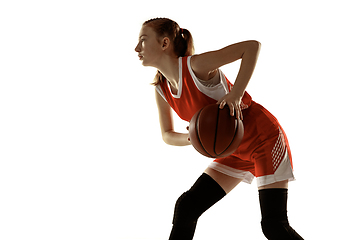 Image showing Young caucasian female basketball player against white studio background