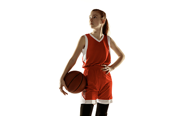 Image showing Young caucasian female basketball player against white studio background