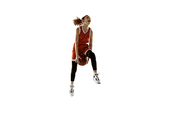 Image showing Young caucasian female basketball player against white studio background