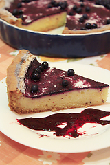 Image showing Piece of pie with bilberry on the plate