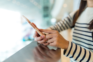 Image showing Woman working on smart phone