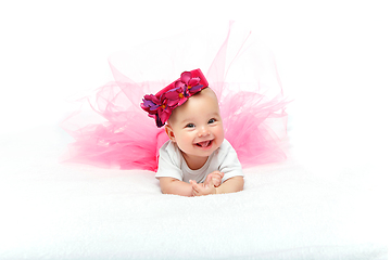 Image showing happy beautiful baby girl with pink hat on head