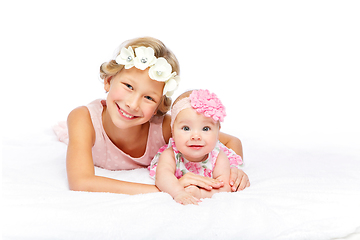 Image showing happy beautiful girl with baby baby sister