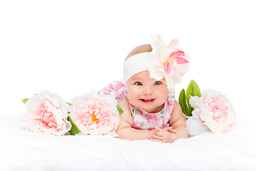 Image showing happy beautiful baby girl with flower on head