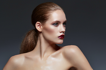 Image showing beautiful girl with long ponytail and red lips