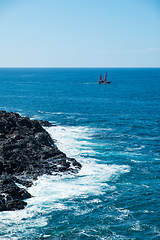 Image showing beautiful view on ocean water and black lava sand