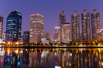 Image showing Bangkok city at night with reflection of skyline