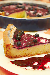 Image showing Piece of pie with bilberry on the plate