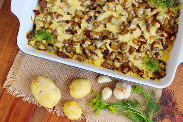 Image showing Baked potato with eggplant cheese and garlic