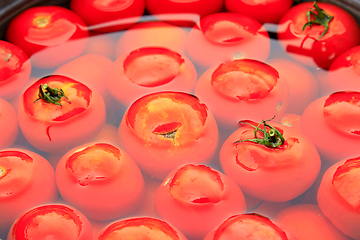 Image showing tomatoes in the water prepared for preservation