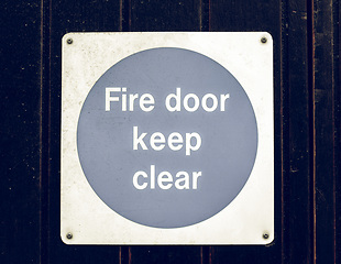 Image showing Vintage looking Fire door