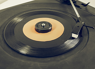 Image showing Vintage looking Vinyl record on turntable