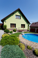 Image showing beautiful green colored rural house