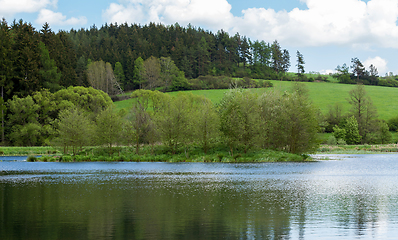 Image showing Beautiful spring landscape with small pond.