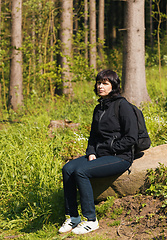 Image showing woman, on hiking trip resting