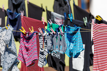 Image showing washed laundry drying outside