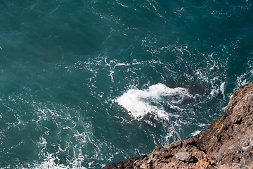 Image showing beautiful view on ocean water and black lava sand