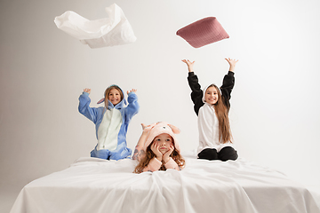 Image showing Children in soft warm pajamas having party colored bright playing at home