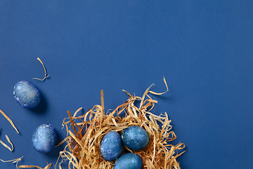 Image showing Egg hunt is coming. Easter traditions, space, cosmos colored eggs, top view