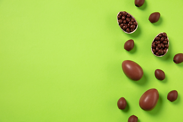 Image showing Egg hunt is coming. Easter traditions, chocolate eggs, top view