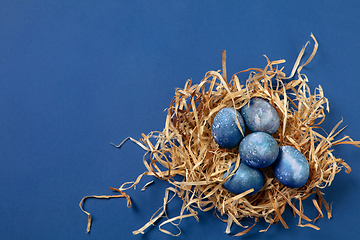 Image showing Egg hunt is coming. Easter traditions, space, cosmos colored eggs, top view