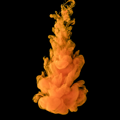 Image showing Explosion of colored, fluid and neoned liquids on black studio background with copyspace