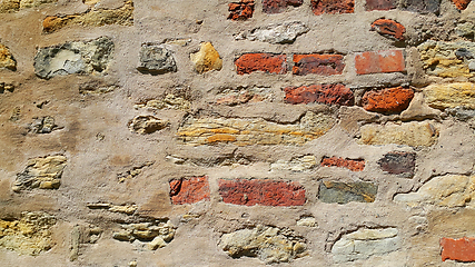 Image showing Very ancient wall with stones and bricks