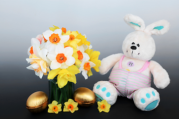 Image showing Easter Bunny Golden Eggs and Spring Daffodil Composition 