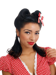 Image showing Young hispanic woman in polka dot top