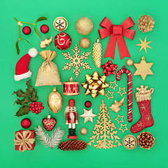 Image showing Christmas Red and Gold Bauble Decorations and Greenery