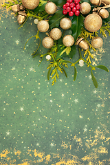 Image showing Christmas Holiday Background with Gold Decorations and Flora