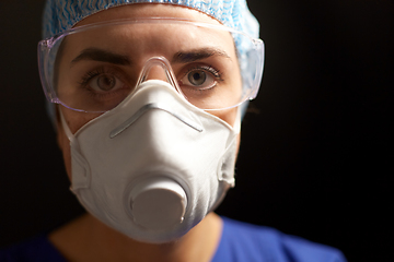 Image showing doctor in goggles and protective face mask