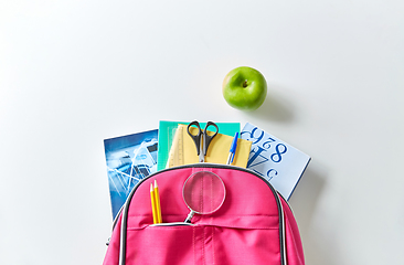 Image showing backpack with books, school supplies and apple