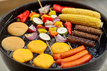 Image showing barbecue kebab meat and vegetables on grill